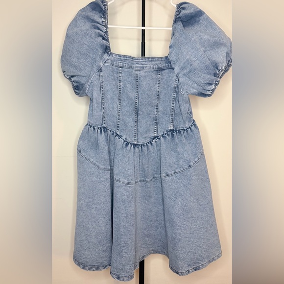GeeGee Dresses & Skirts - Denim Puff Sleeve Dress The fabric stretches a little.